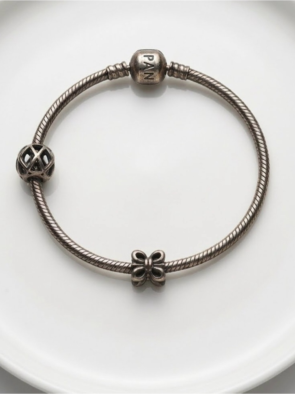 Authentic Pandora Bracelet 7.5inch, sterling Silver, 2 charms